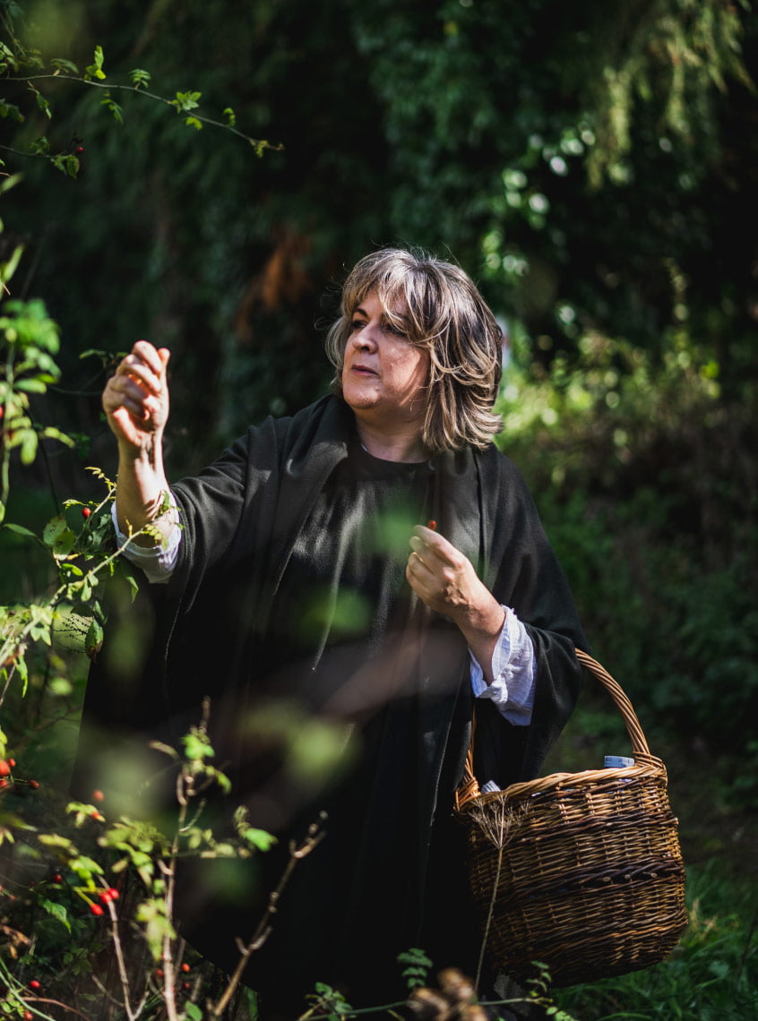 Irish folklorist leading magical forest walk exploring Celtic mythology and Pagan traditions