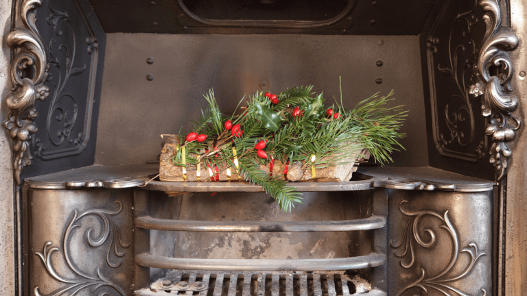 Viking reenactor by a roaring bonfire